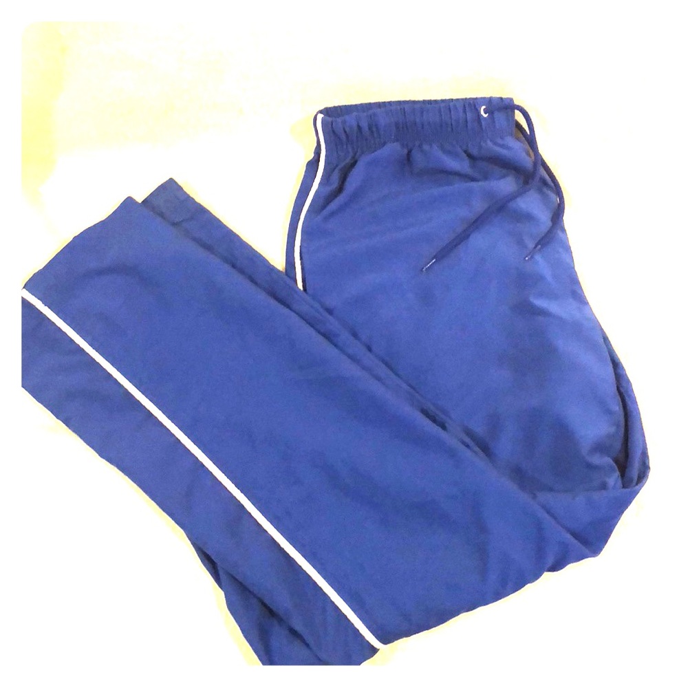 Blue sweatpants with white pinstripe